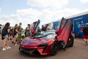 Teenagers around car exhibit at RIAT25.