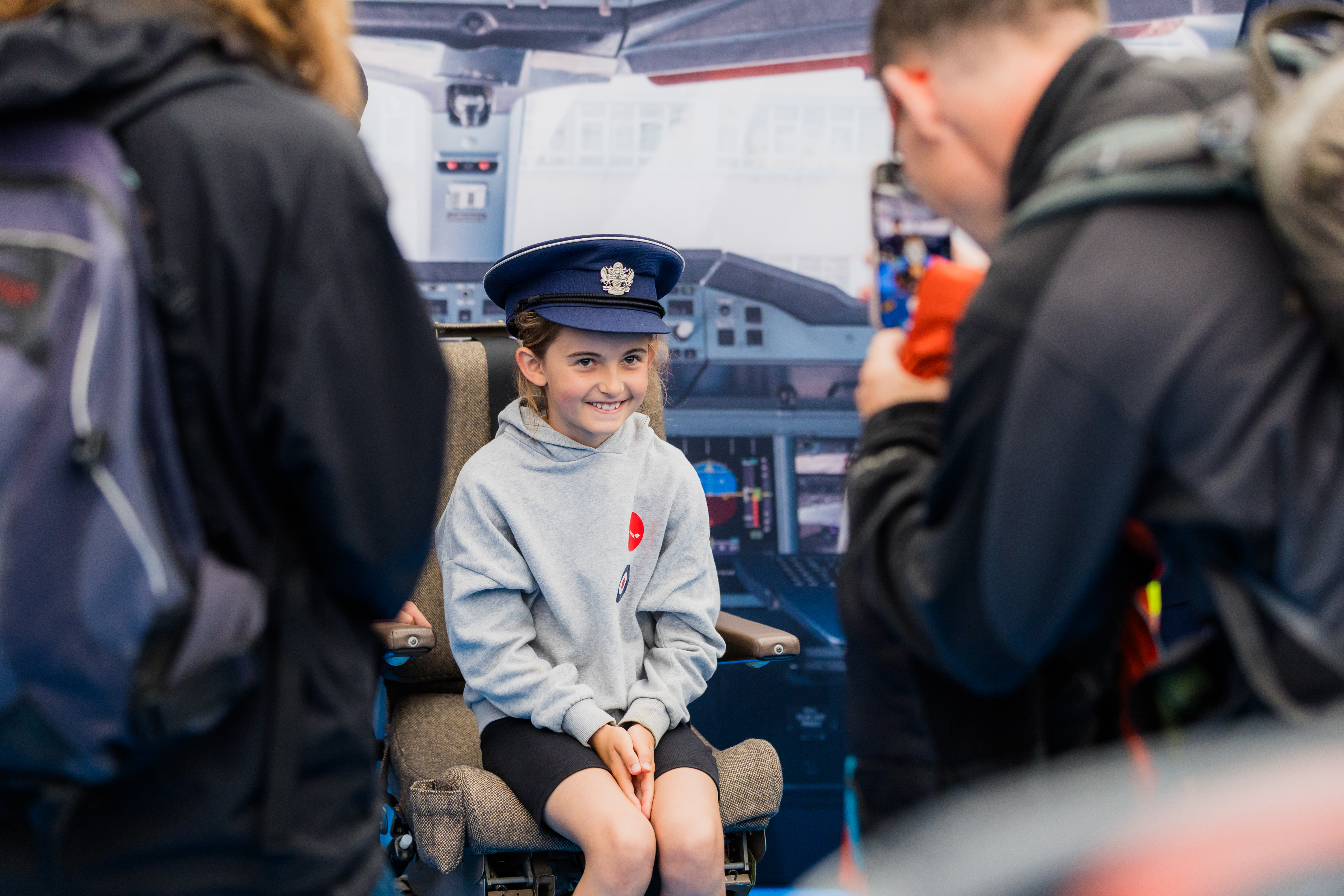 Girl wearing a Royal Air Force hat for Engineers of tomorrow at RIAT25.