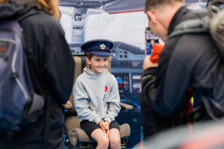 Girl wearing a Royal Air Force hat for Engineers of tomorrow at RIAT25.