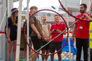 Boys and girls in front of hoops exhibit in the Techno Zone at RIAT25.