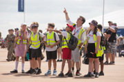 Group of school children outside Techno Zone at RIAT25.