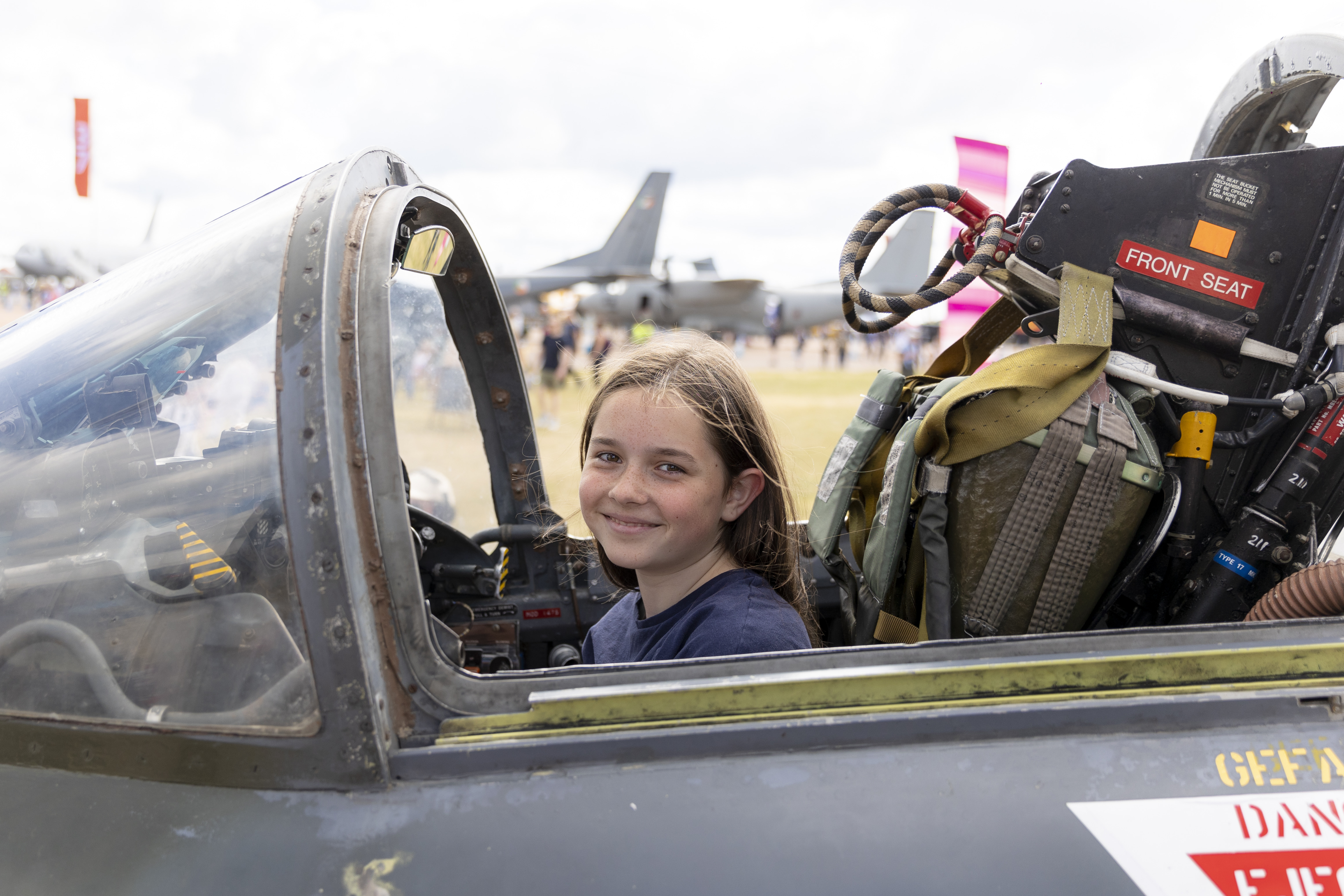 RIAT24 young girl sitting in the cockpit of an aircraft