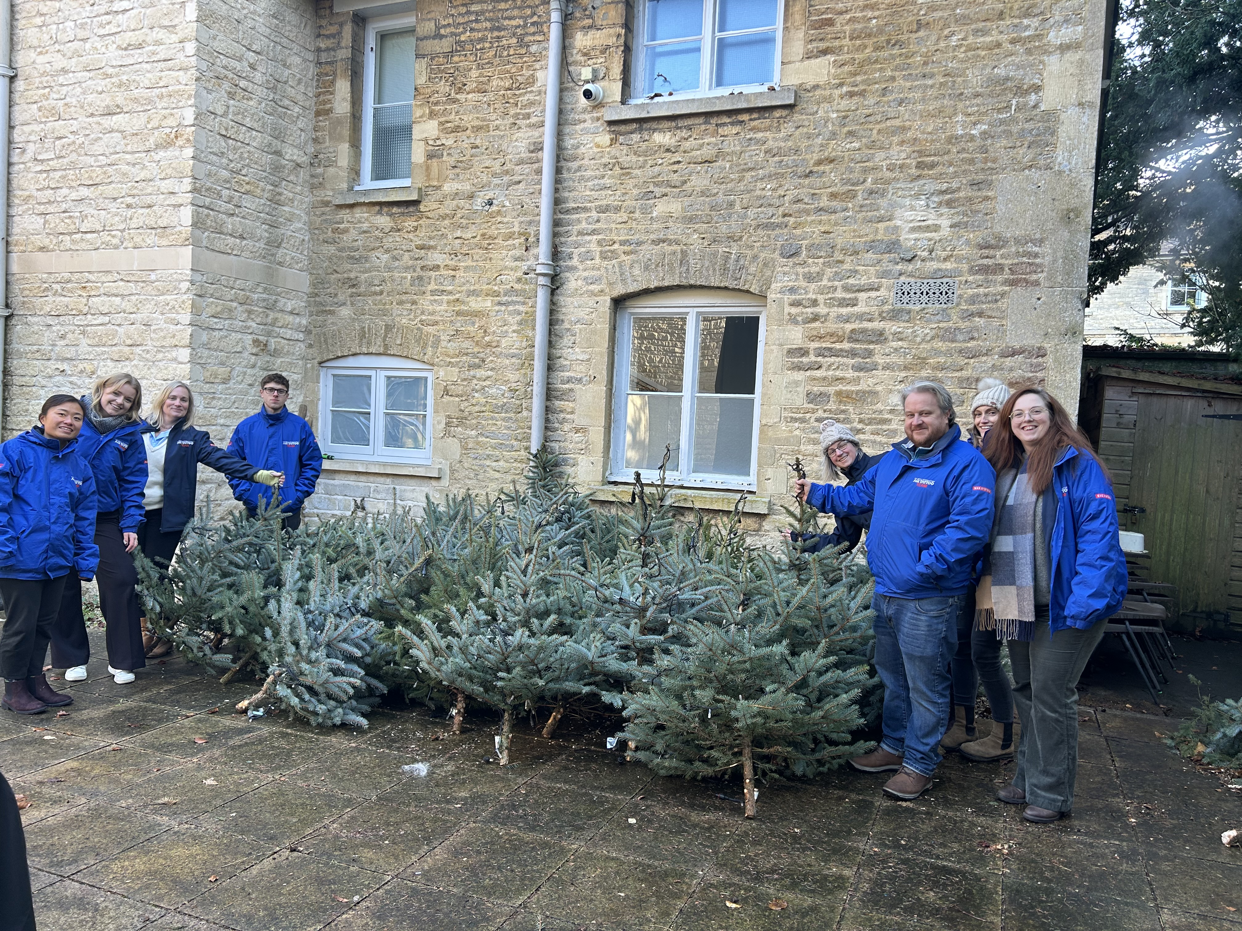 RIAT staff working in the local community, helping to decorate for Christmas.