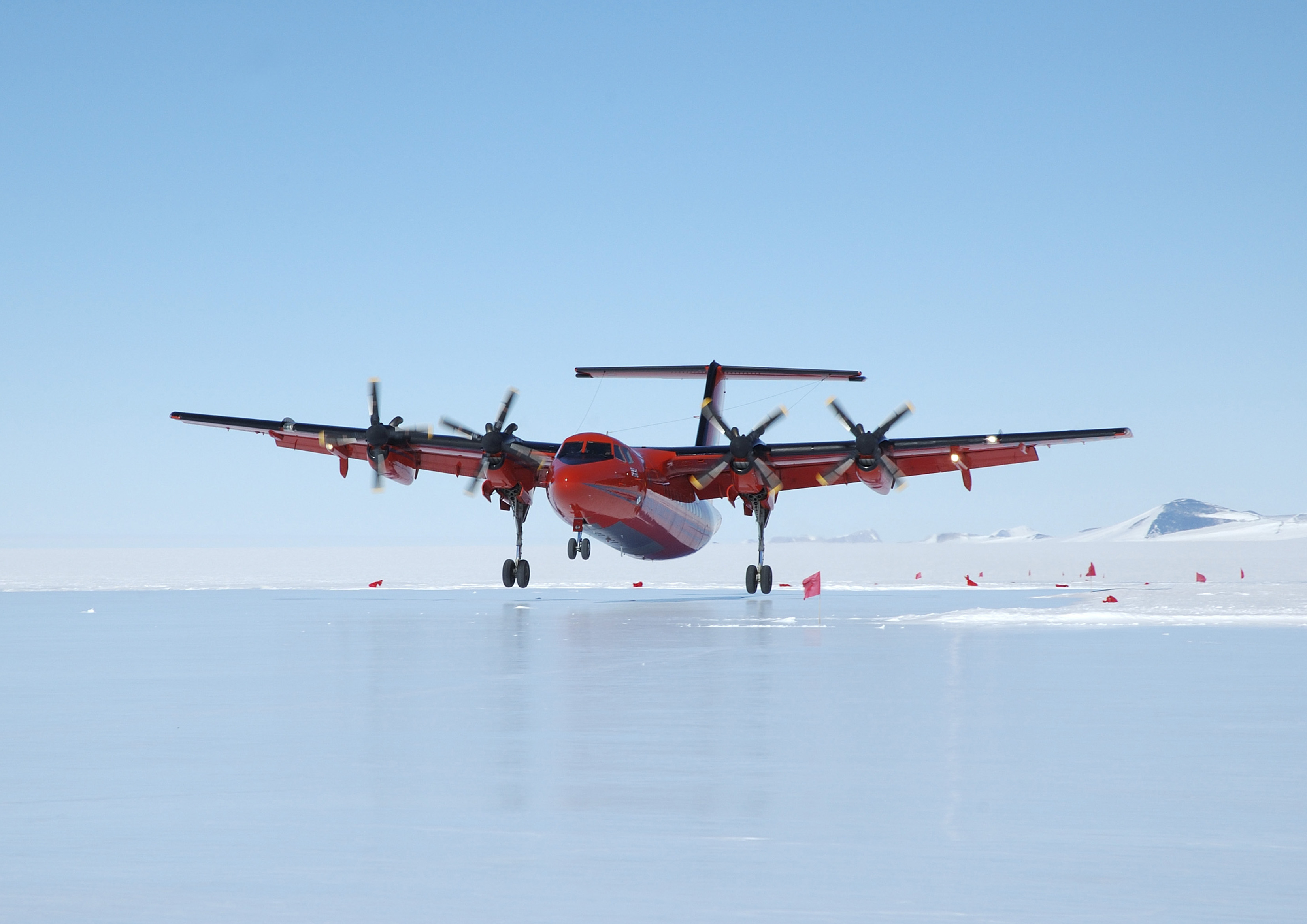 Dash 7 landing on the blue ice runway at Sky Blu.