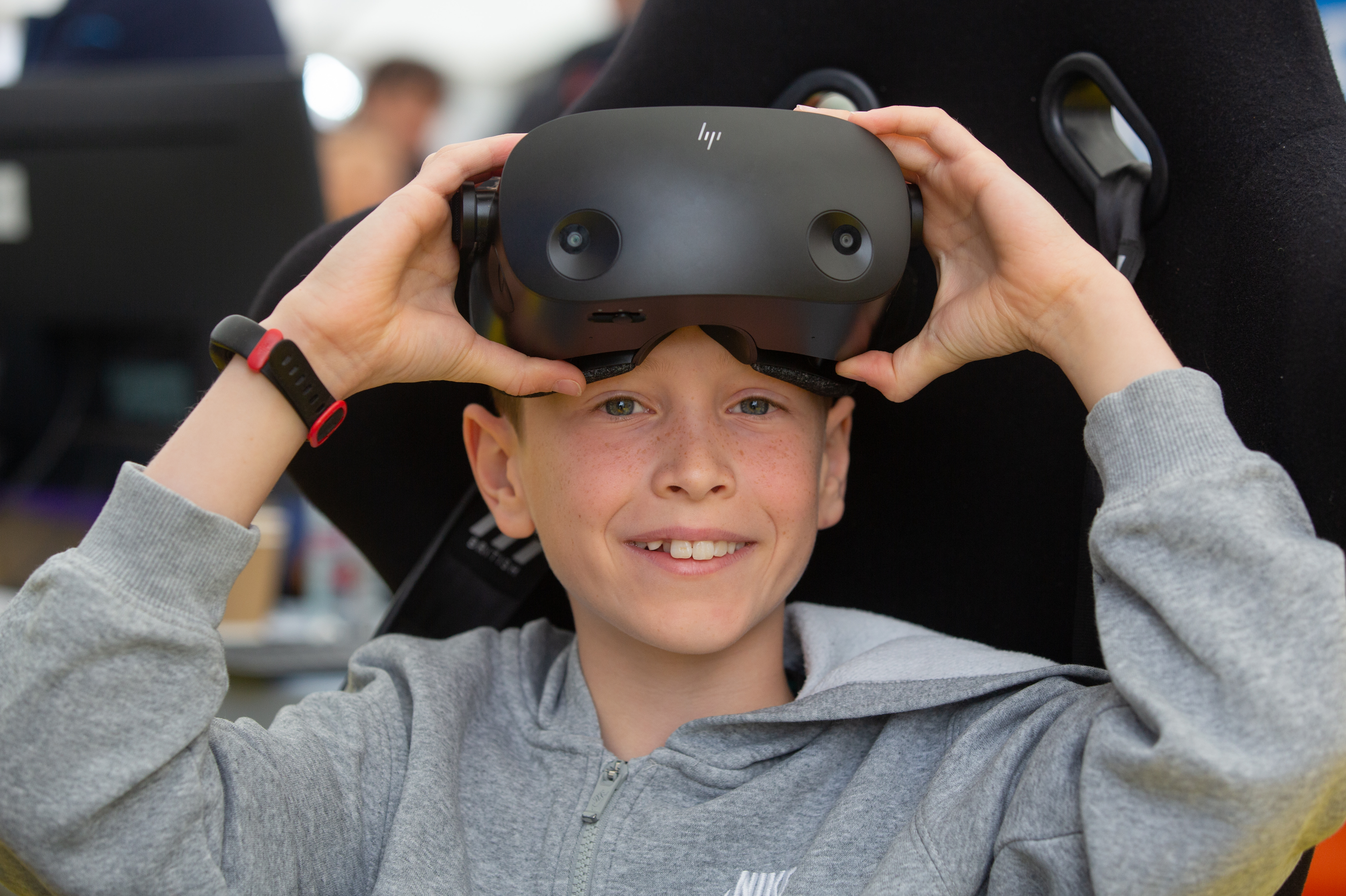 Boy with simulator headset for Power Up in the Techno Zone at RIAT25.