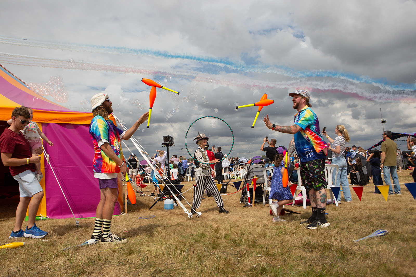 Jugglers performing in the Family Enclosure at RIAT25.