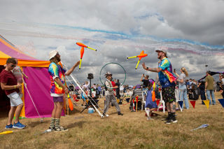 Jugglers performing in the Family Enclosure at RIAT25.
