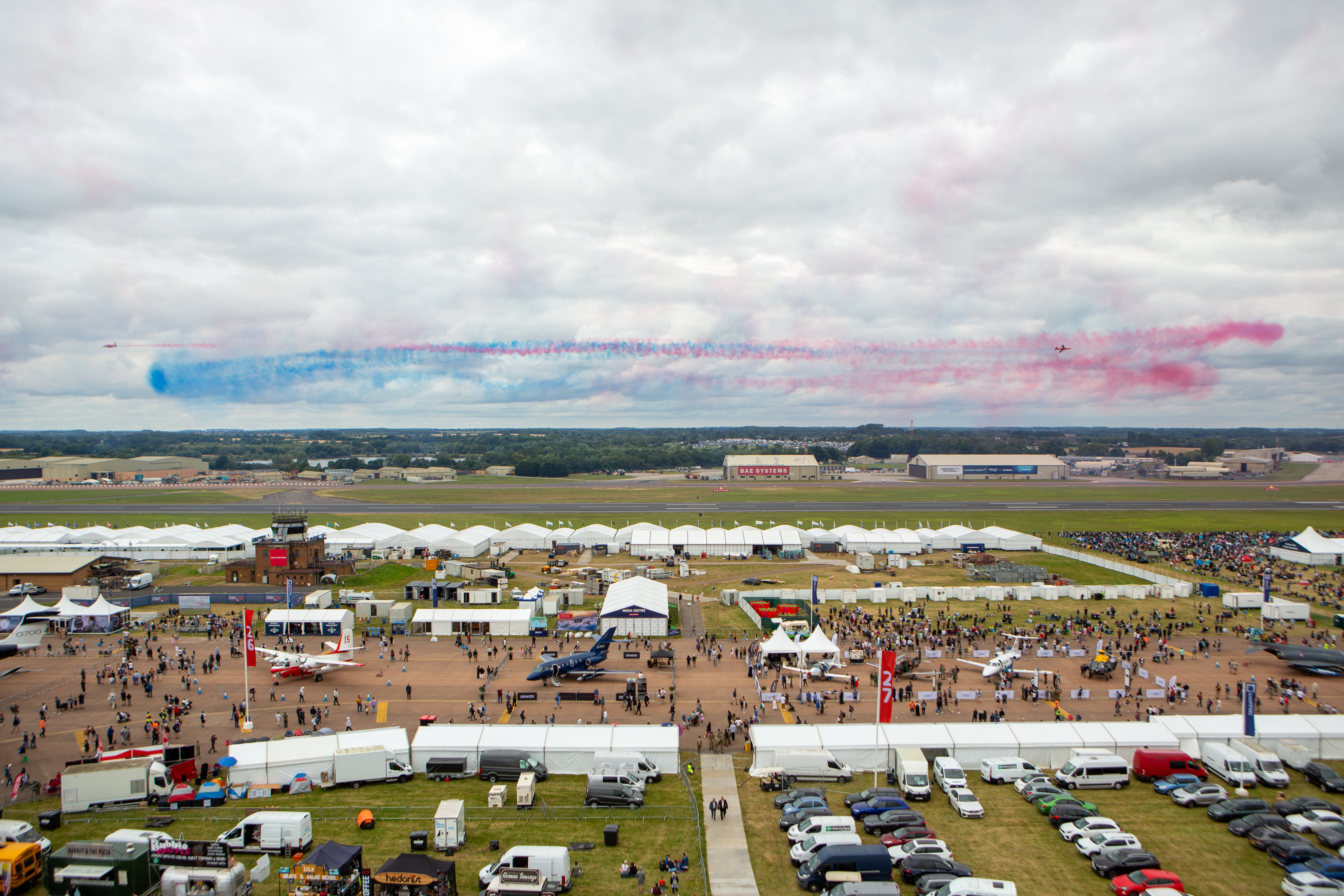 RIAT24 Showground With Coloured Smoke From Aircraft Display